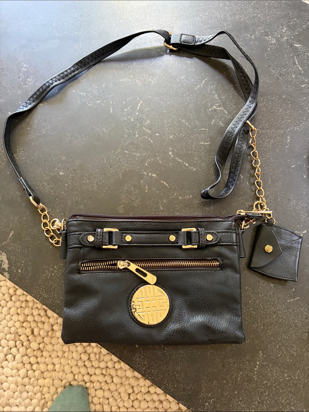 Black Leather Crossbody Bag with Gold Accents